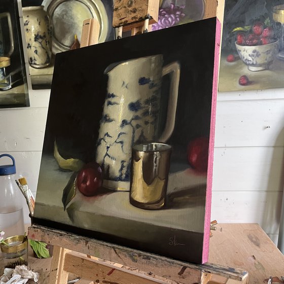 Plums and china jug.