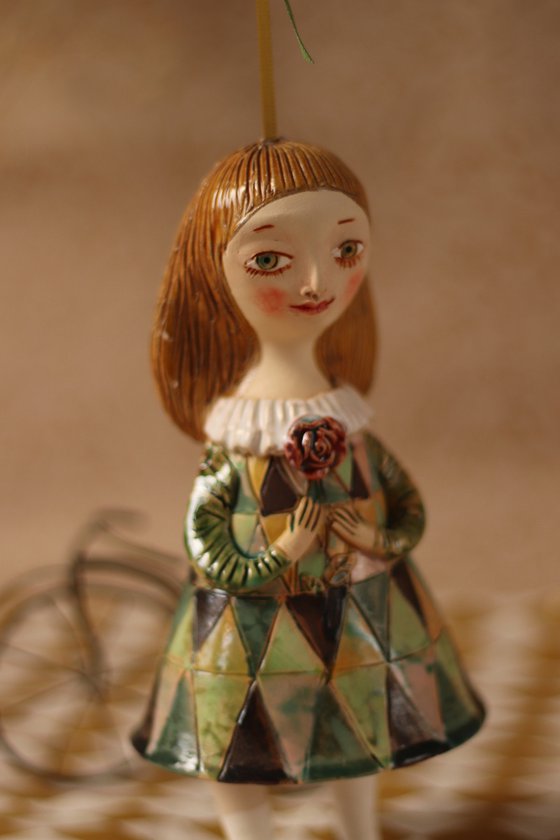 Innocent little girl with a flower. Hanging sculpture, bell doll by Elya Yalonetski