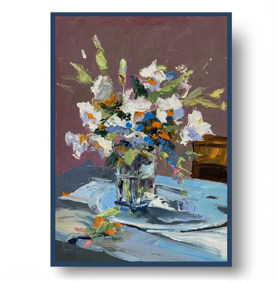 White flowers in a glass vase.