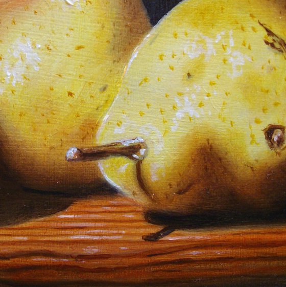 Three pears in chiaroscuro