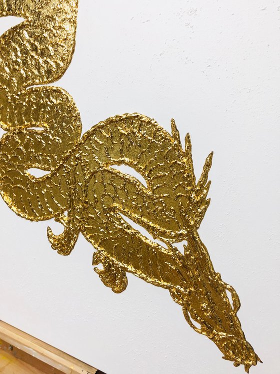 Golden dragon on white