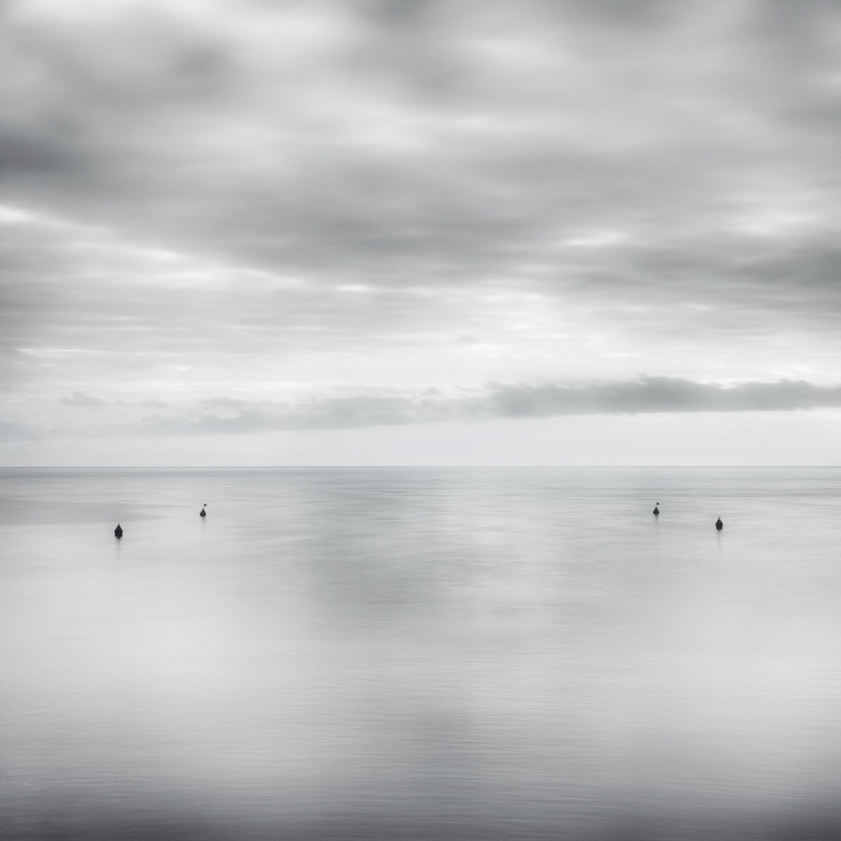 Four buoys by Karim Carella