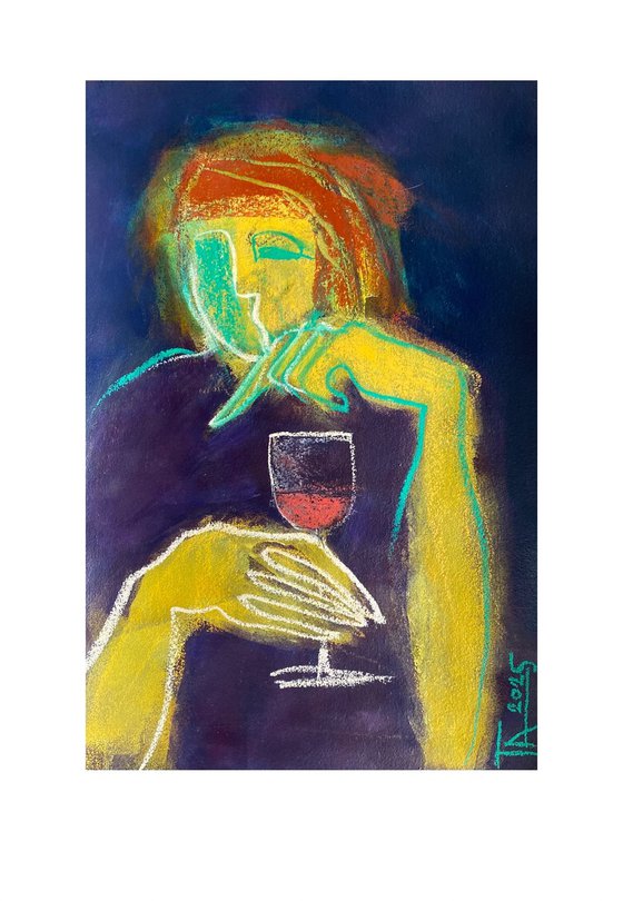 With a glass of red wine.