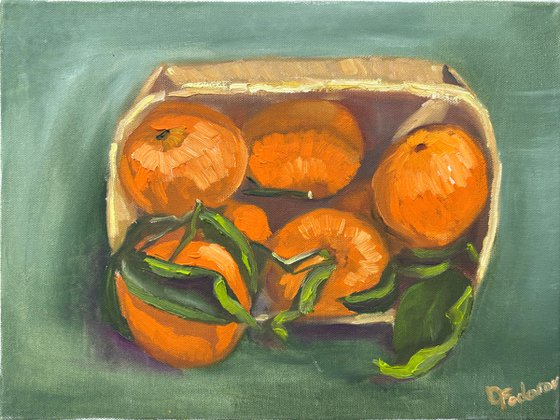 Tangerines in a wooden basket
