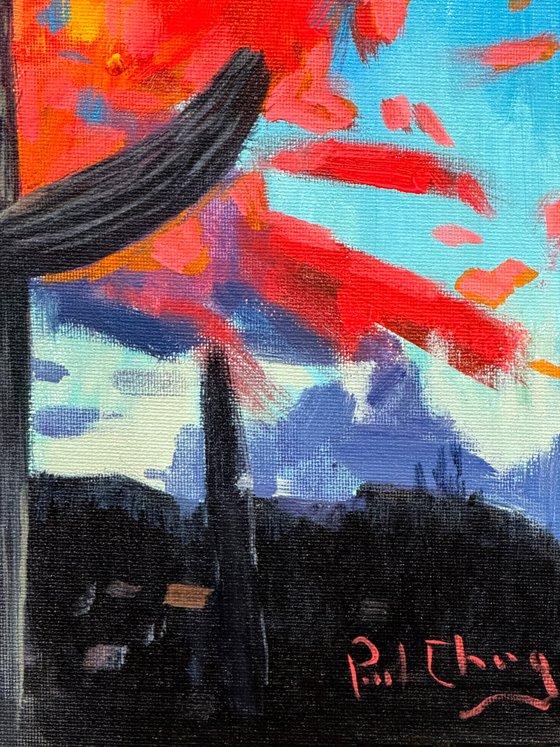 Sentinel Beneath a Fiery Sky