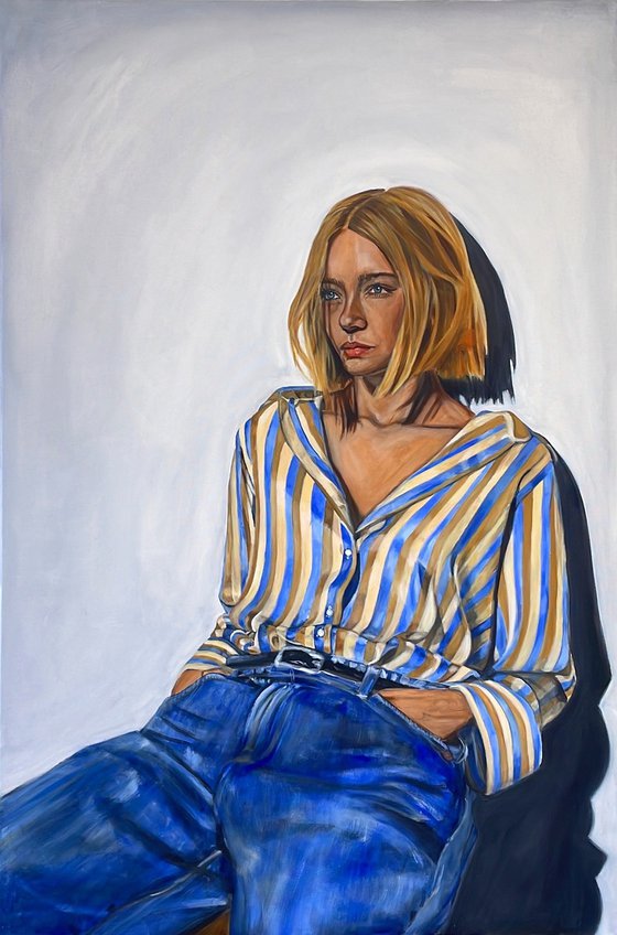 Pause: A Girl in Jeans and a Blouse