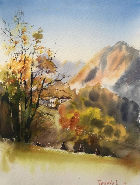 Autumn tree at the mountains