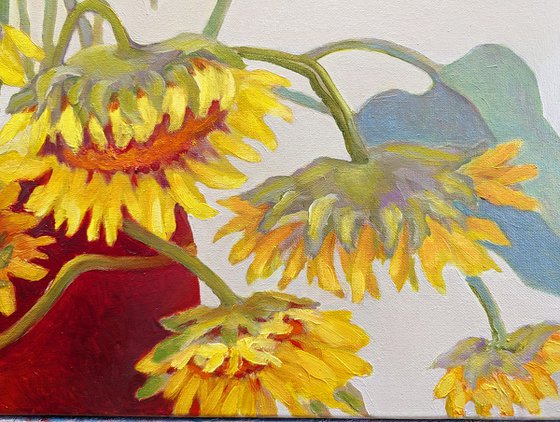 Red wase with Sunflowers.