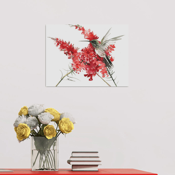 Hummingbird and red flowers