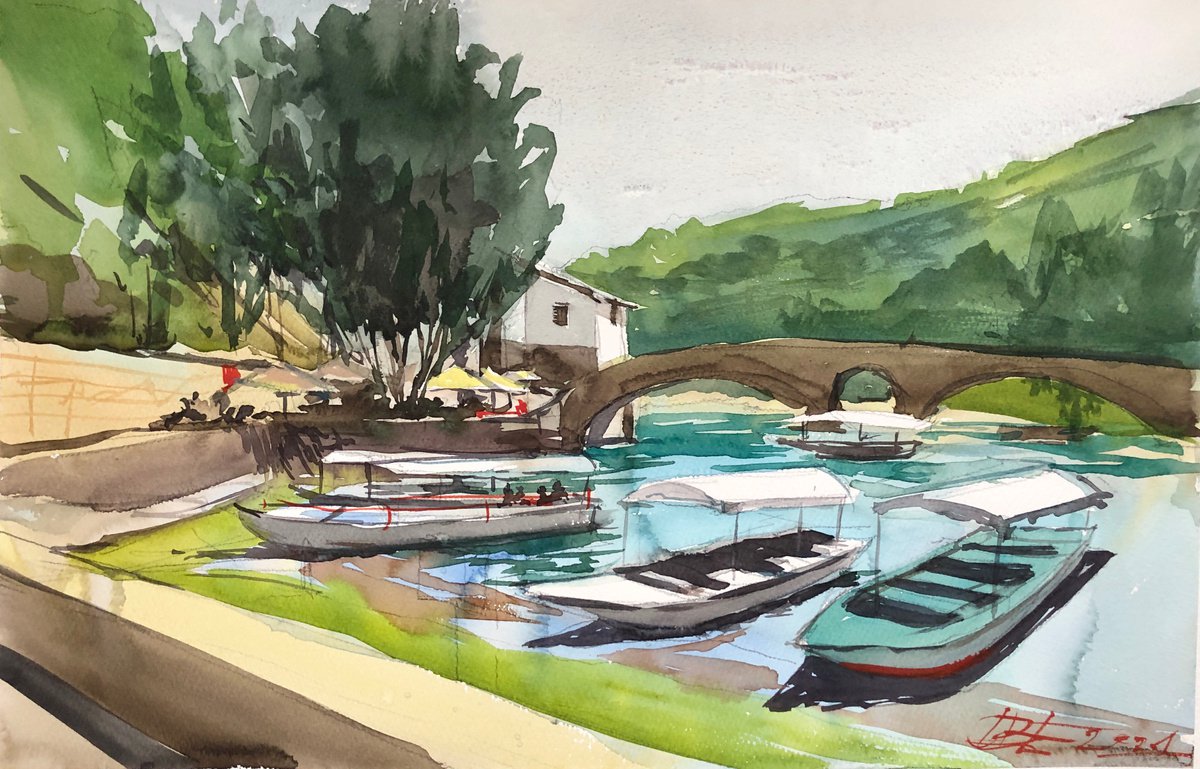 Boats in Rjeka Crnojevica by OLGA BELOBORODOVA