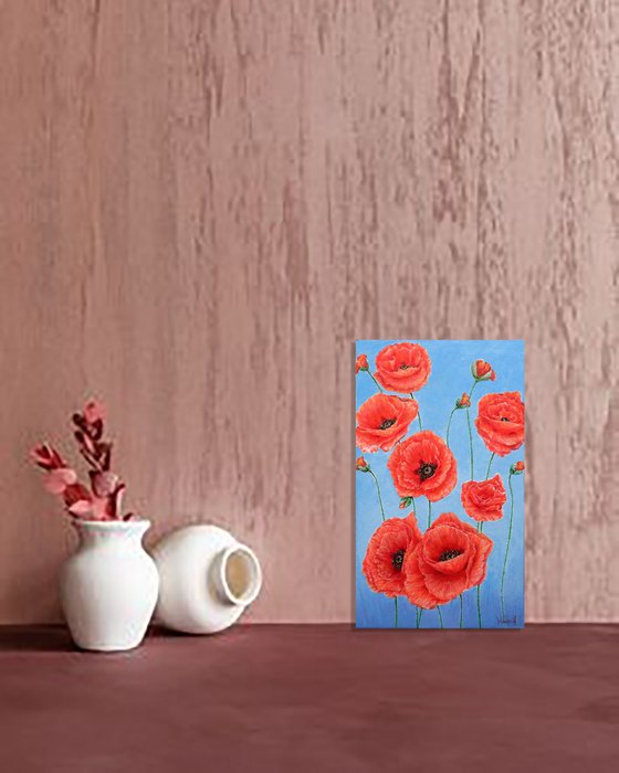Poppies on blue.