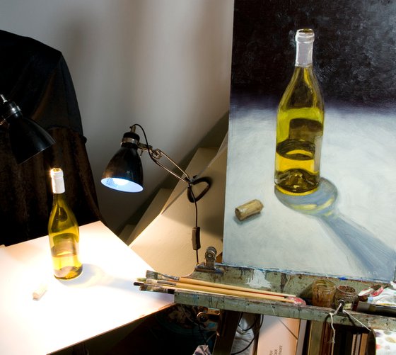 gift for drink lovers: still life of a bottle of french wine on light background