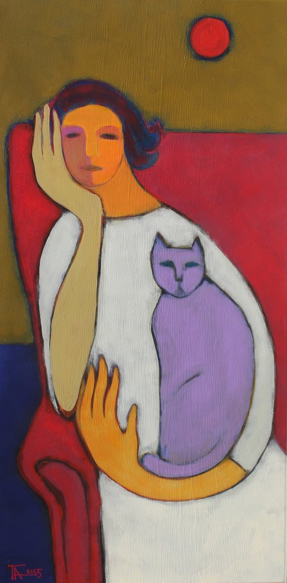 Portrait in a red chair.