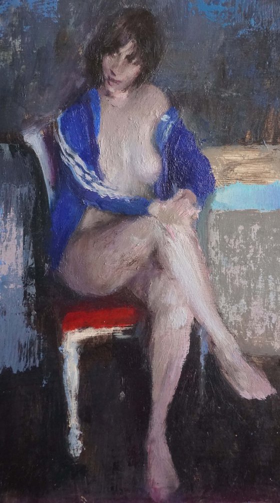 Lucile on red chair