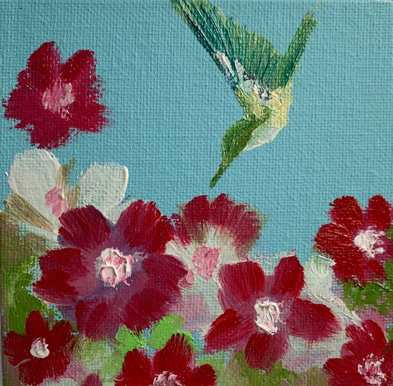 Hummingbird and flowers