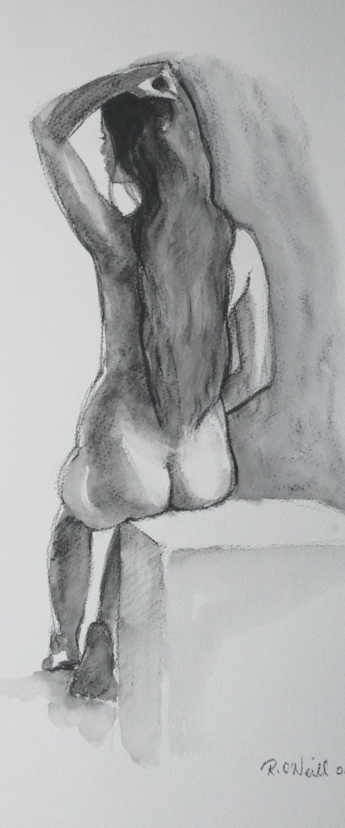 Seated female nude by Rory O’Neill