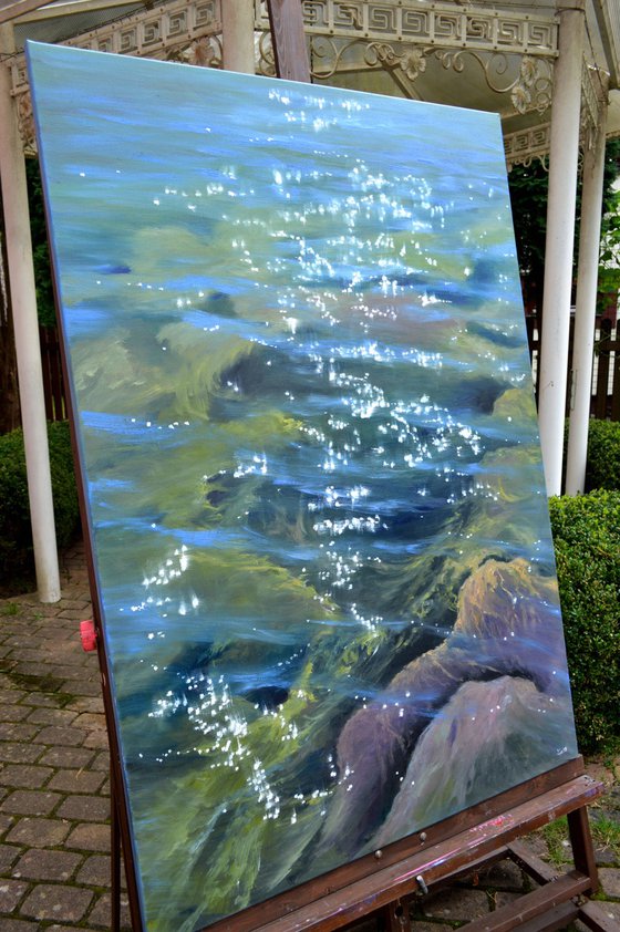 Music of the sea. Transparent water. Large