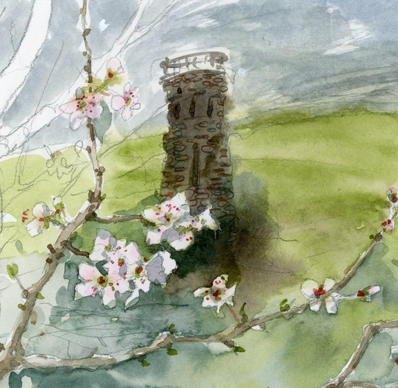 Landscape with an old tower and plum blossoms.