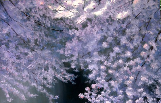 Blooming garden by the pond