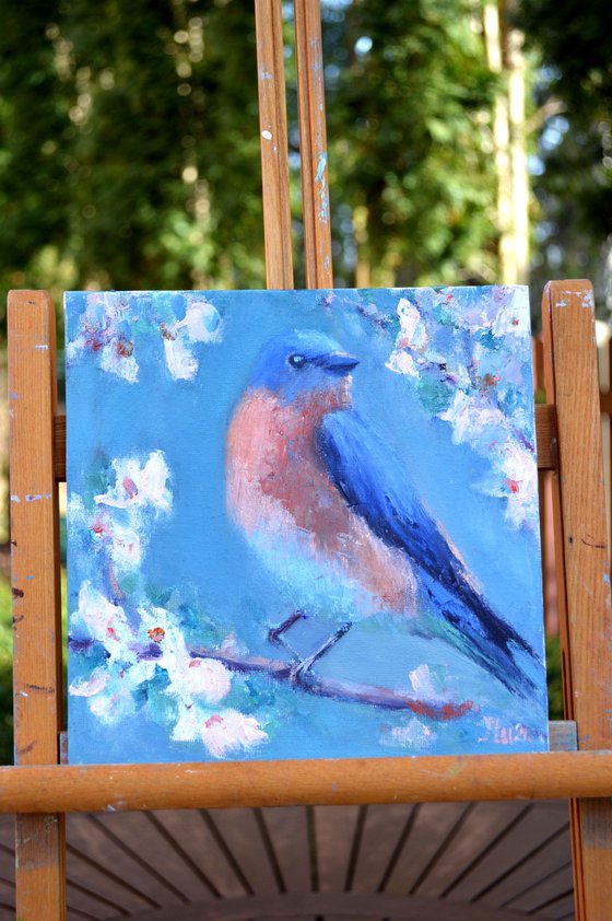 Bird on a flowering branch