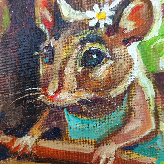 The mouse is baking a strawberry pie