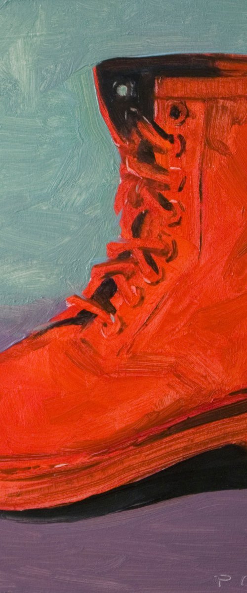 red Doc Marten's shoe by Olivier Payeur