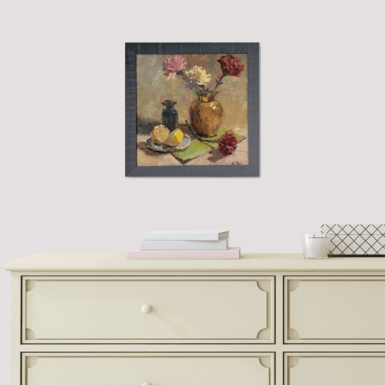 Copper vase and some lemons