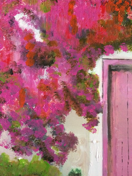 Mediterranean House with Pink Flowers