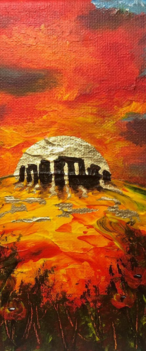 Stone Henge with a rising golden sun by Marja Brown