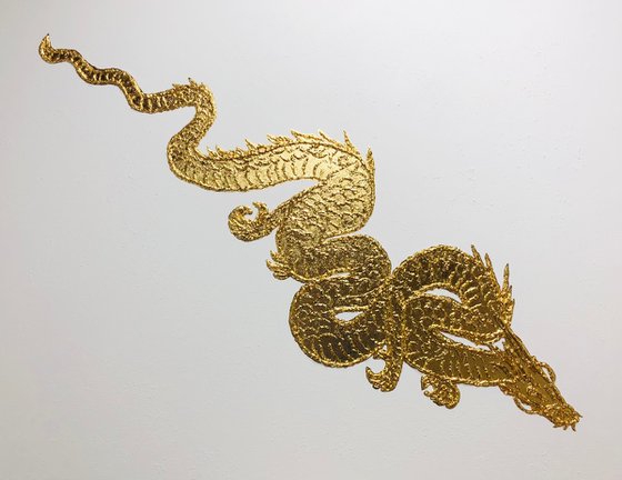 Golden dragon on white