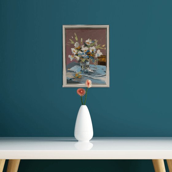 White flowers in a glass vase.