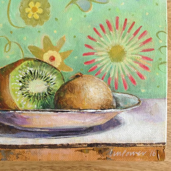 Kiwi fruit with a floral background