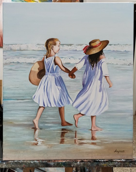 On the beach - portrait of little girls