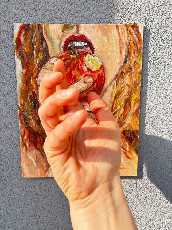 A Girl Eating an Apple