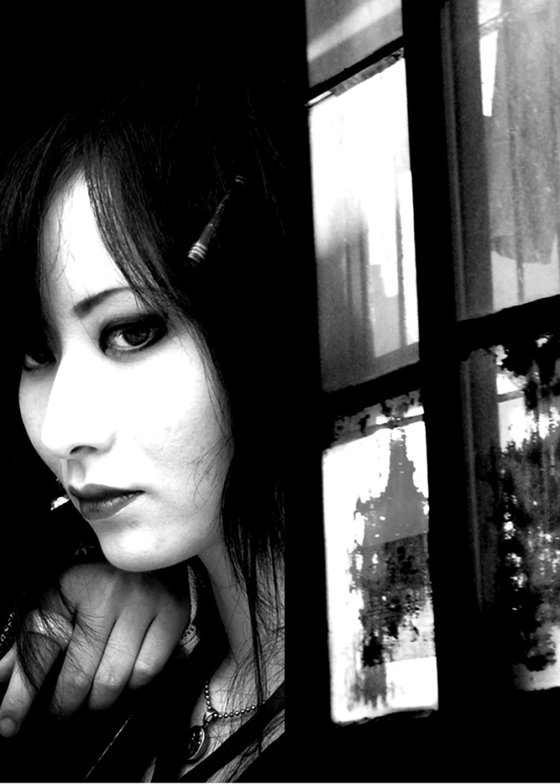 Japanese Girl Looking in the Window