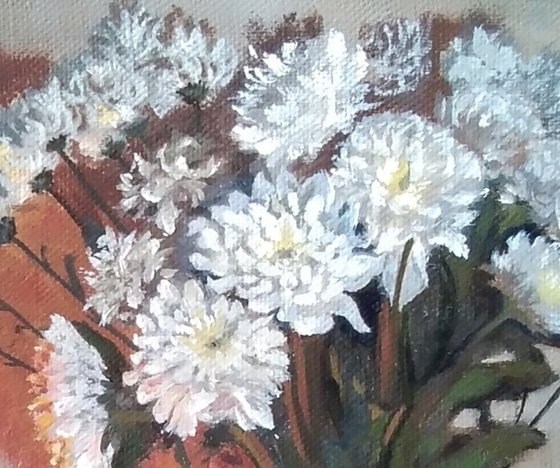 Flowers and candles - painting with white chrysanthemums and a glass of wine