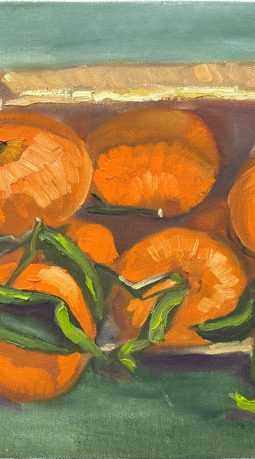 Tangerines in a wooden basket by Dmitry Fedorov