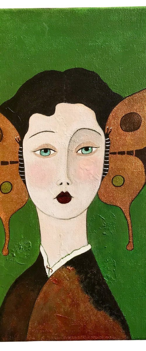 Woman with golden butterflies by Eleanor Gabriel