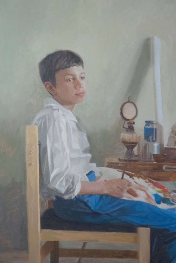 Boy infront a tripod