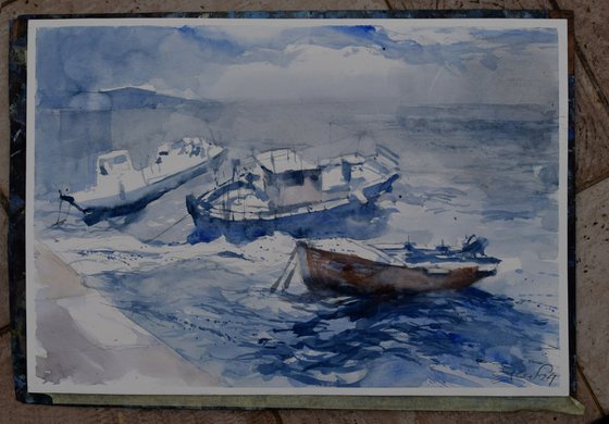 Boats in rough sea