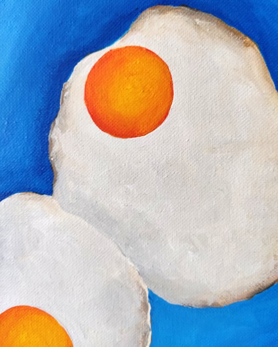 Still life with baked eggs