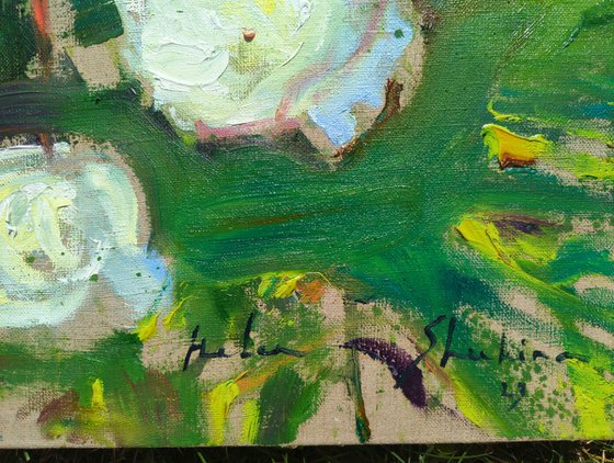 White peonies on linen background