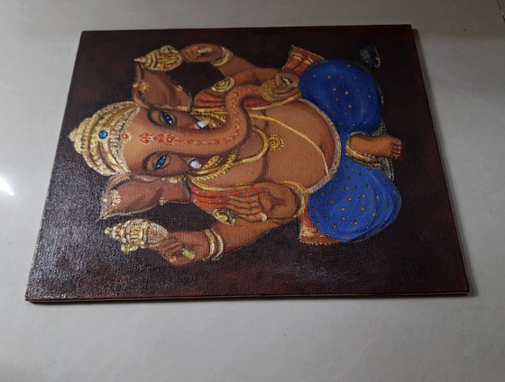 Lord Ganesh with blue eyes