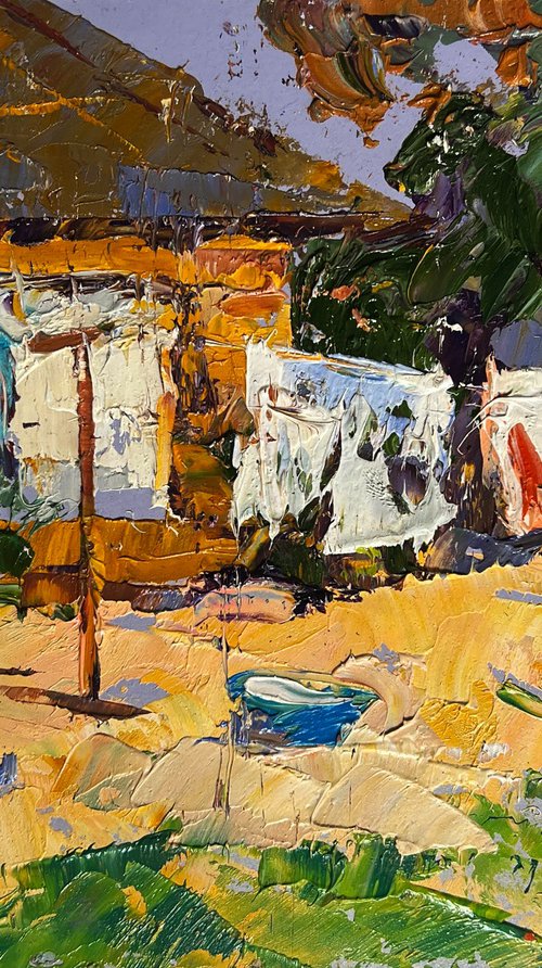 Clothes are drying in the yard by Kalenyuk Alex