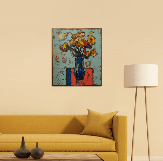 Still-life. Yellow bouquet in a blue vase