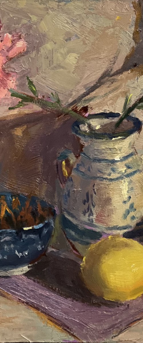 Lemons and flowers with a vase by Nithya Swaminathan