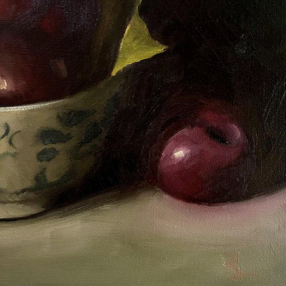 plums in a china bowl