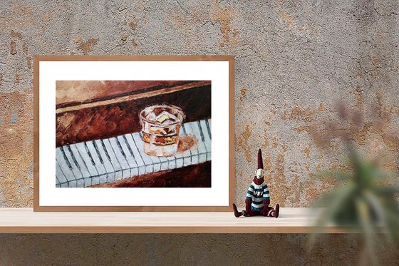 Glass of whiskey on the piano