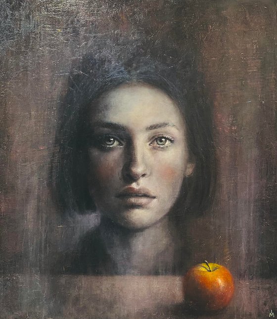 A woman and a bitten apple