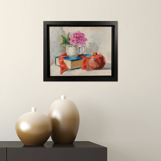 Teacups, Peony flower, Books and pomegranate.